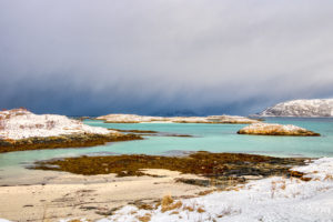 Bad Weather approaching snowy beach