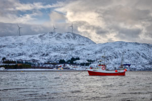 Boat in a Fjord and Windmills