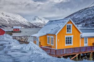 Yellow house in Norwegian Fjord